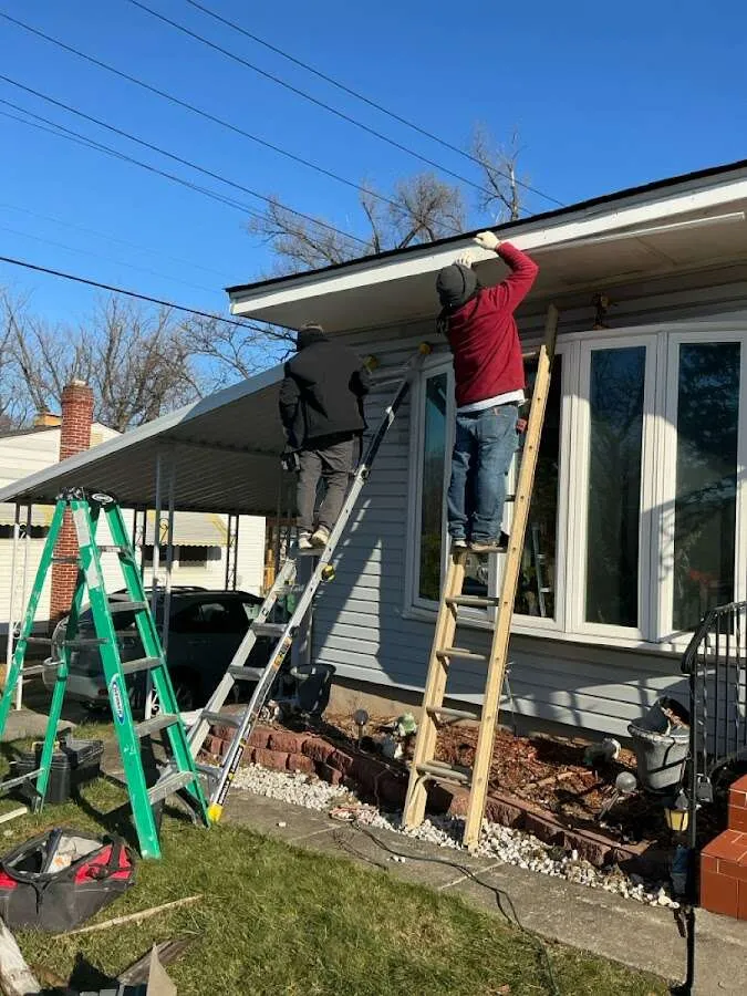 Restoration crew performing exterior repair in Oak Point